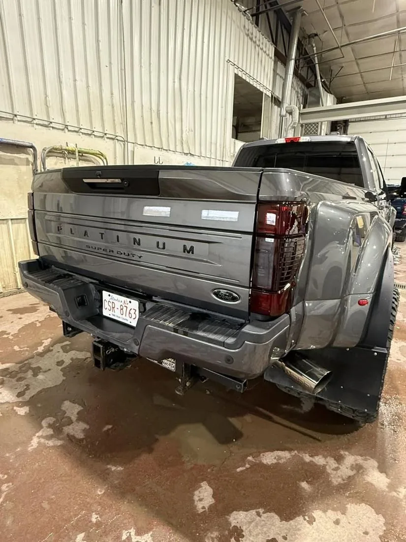 Ford F-450 Platinum Super Duty dually at a Grande Prairie auto body shop